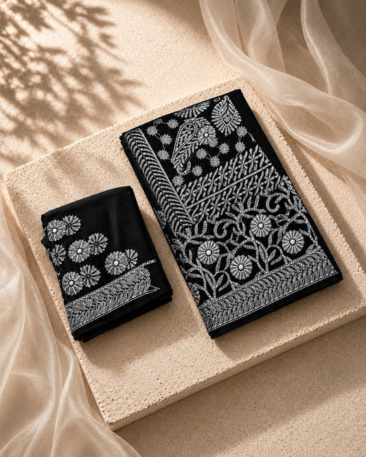 Black Georgette Ready to Wear Chikankari Saree, Naaz Collection by Masnavi, flat lay with matching unstitched blouse.