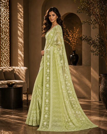 Green Georgette Ready to Wear Chikankari Saree, Naaz Collection by Masnavi, modeled by a woman, side view