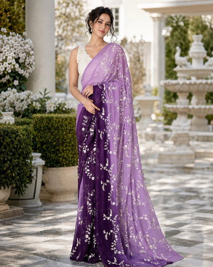 Lilac Georgette Sequin Work Chikankari Designer Saree, by Masnavi, modelled by a woman in a courtyard, front view