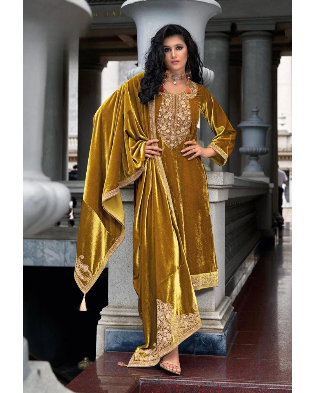 Woman in Masnavi Makhmali Embroidered Velvet Suit Set in Gold with Zari Dupatta & Parallel Pants