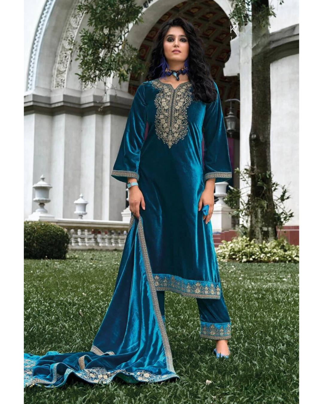 Woman in Masnavi Makhmali Embroidered Velvet Suit Set in Peacock Blue with Zari Dupatta & Parallel Pants