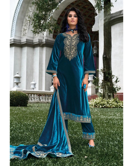 Woman in Masnavi Makhmali Embroidered Velvet Suit Set in Peacock Blue with Zari Dupatta & Parallel Pants