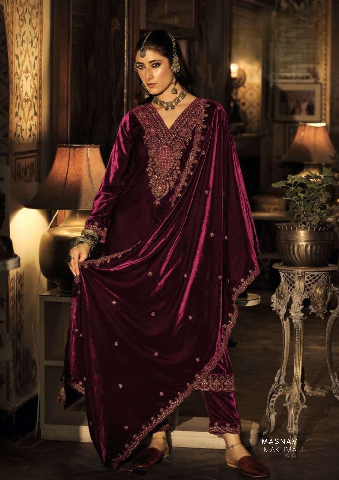 Woman in Noor Jahan Makhmali Embroidered Velvet Suit Set in Mulberry with Scalloped Zari Dupatta & Straight Trousers