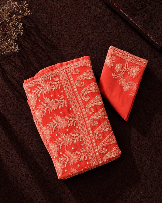 Peach Georgette Ready to Wear Chikankari Saree from Naaz Collection by Masnavi with matching blouse piece, flat lay.