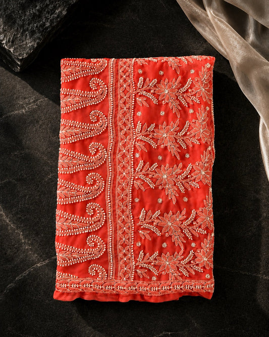 Peach Georgette Ready To Wear Chikankari Saree, Naaz Collection by Masnavi, flat lay featuring authentic Lucknow Chikankari.